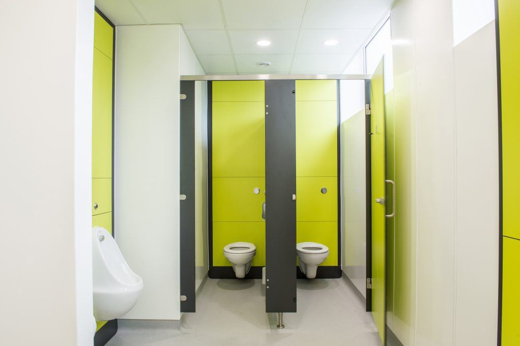 Ryefield Primary School toilet cubicles with open doors.