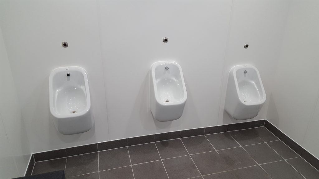 Three urinals at Corfe Castle.