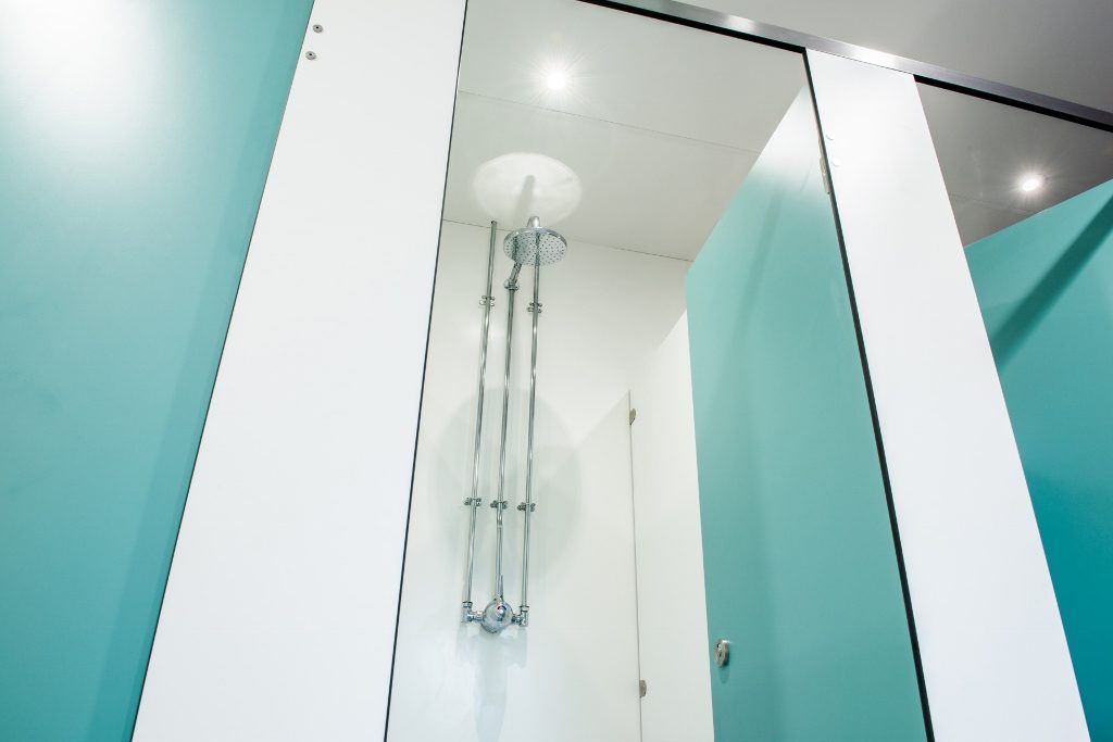 Berkshire school dormitory toilet and shower cubicles.