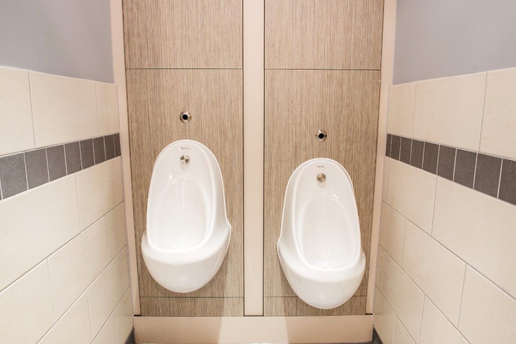 Two urinals inside the toilets at Little Ship Club Restaurant, London.