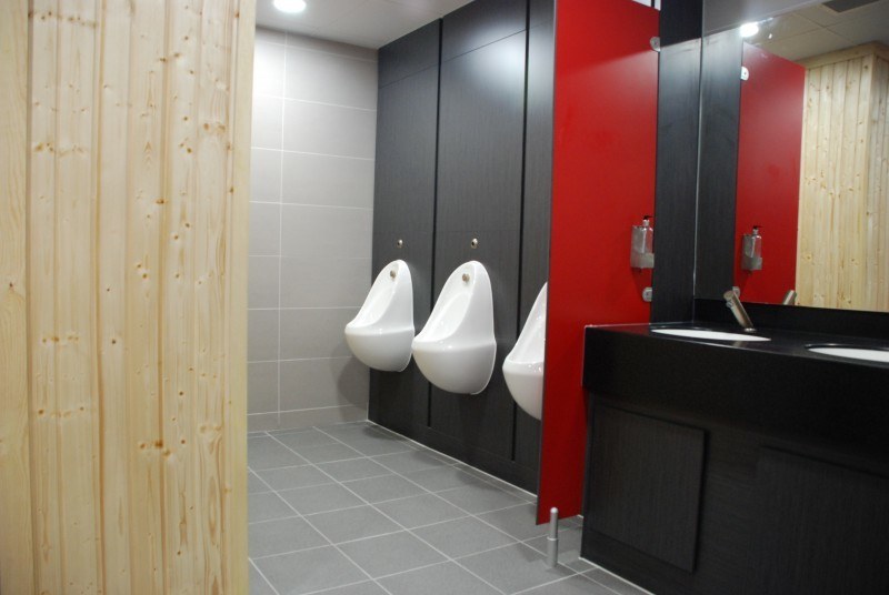 Urinals and sinks inside Junction Sports Centre Gym.